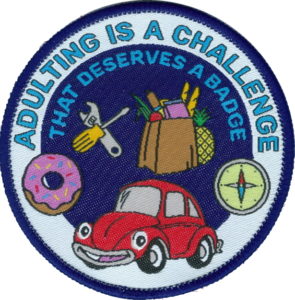 Badge with car, shopping and tools