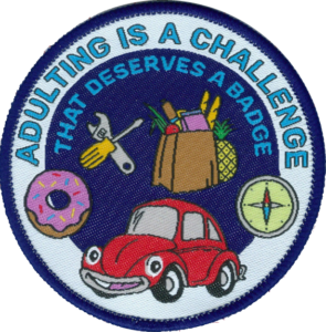 Badge with car, shopping and tools