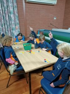 Girls playing bingo game