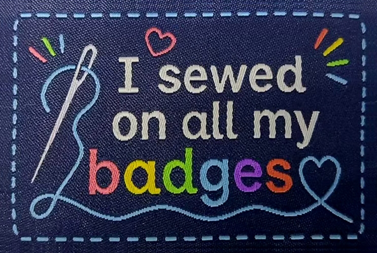 I sewed on all my badges