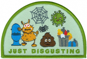 Badge with monster and toilet