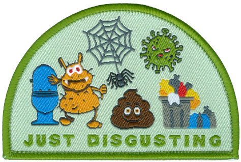 Badge with monster and toilet