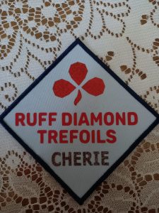 Badge with logo for Trefoils