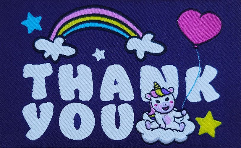Unicorn with heart balloon