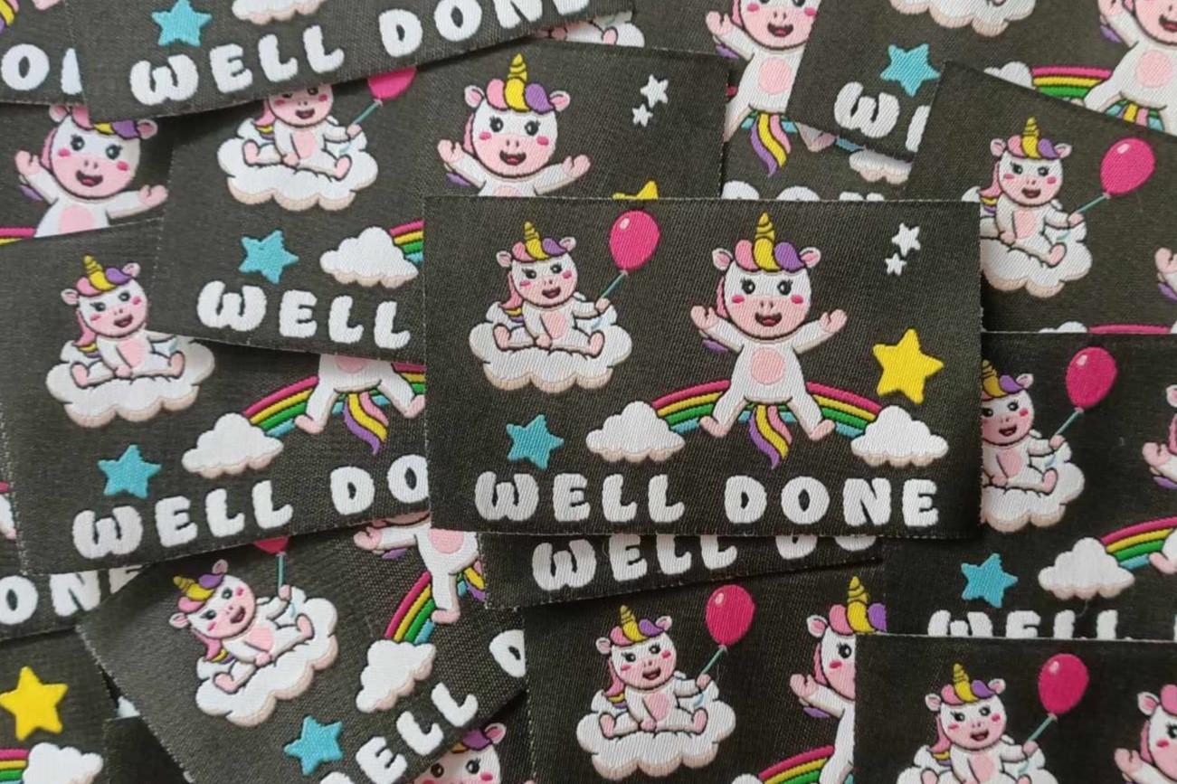 Unicorns with balloon and rainbow